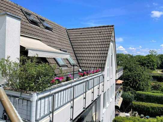 Attraktive Immobile an der südlichen Berliner Stadtgrenze: Helle Maisonette-Wohnung mit 2 Balkonen