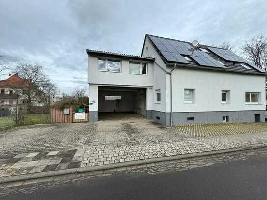 Sehr schönes 2-Familienhaus mit 50m² Garage/Werkstatt inkl. Baugrundstück