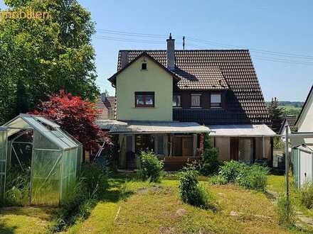 Ein Zweifamilienhaus in ruhige und zentraler Toplage !