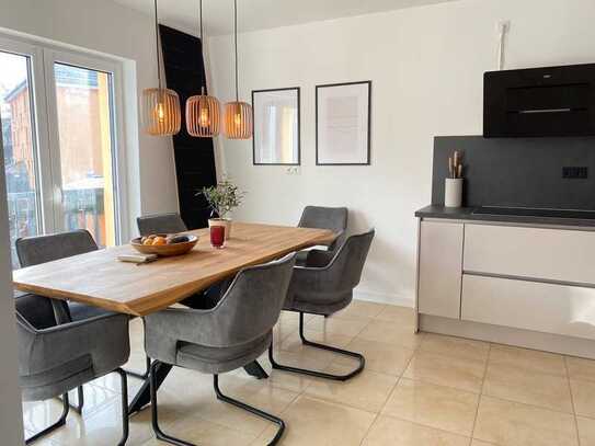 Kleine 3-Zimmer-Wohnung mit sonniger Terrasse und Gartenanteil sowie 2 PKW-Stellplätzen!