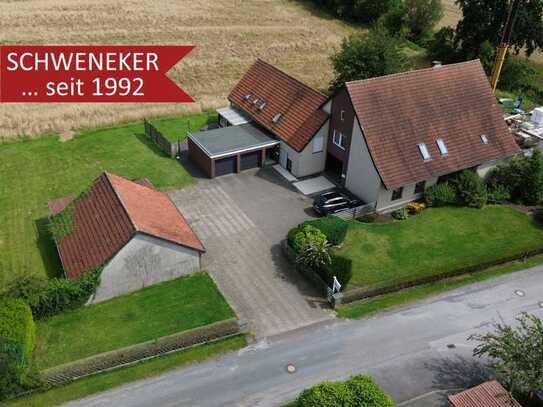 Ländliches Wohnen mit Weitblick! Großzügiges Dreifamilienhaus in Bünde-Dünne!