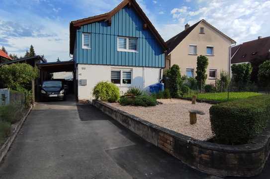 Einfamilienhaus mit Carport Terrasse Teich