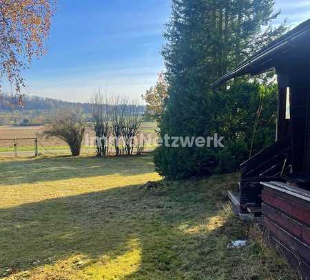 Grundstück mit Blockbohlenhaus am Trappenberg