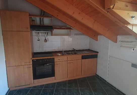 Dachwohnung mit EBK und Gartennutzung