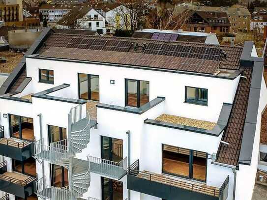 Mitten im Zentrum! Barrierefreie 3-Zi.-Neubauwohnung mit attraktiver Dachterrasse!