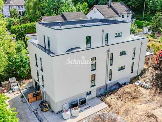 Neubauwohnung! Barrierefreie helle Wohnung, Aufzug, Citynah, Carport und ruhiger sonniger Balkon