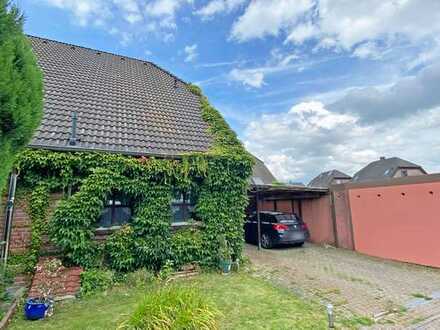 Idyllische Doppelhaushälfte mit Carport in beliebter Lage von Wesel-Lackhausen!