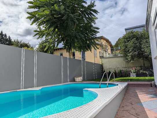 Bungalow mit Pool, Garten, Doppelgarage uvm. in idyllischer Lage