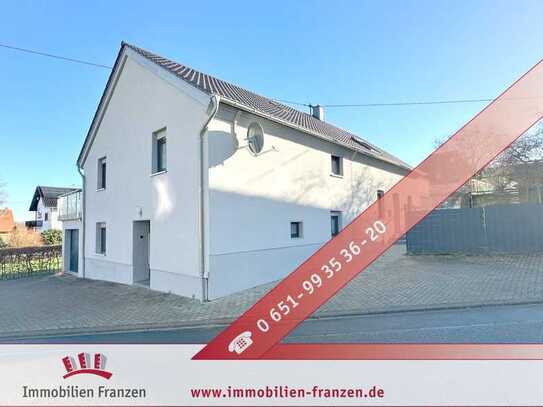 Schillingen: Saniertes Ein- bis Zweifamilienhaus mit großer Garage und schönem Garten!