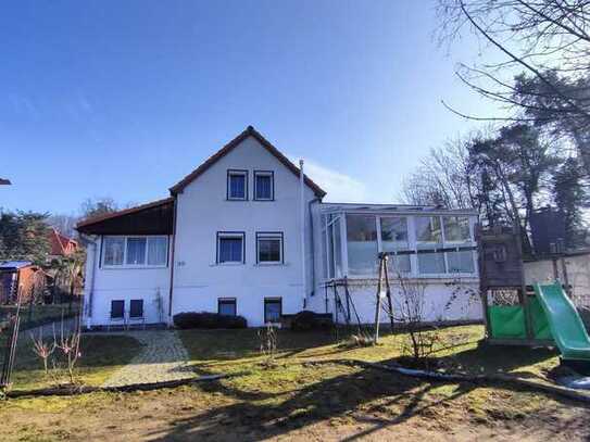 Grüne Lage in Coswig: Einfamilienhaus mit Wintergarten & Kamin
