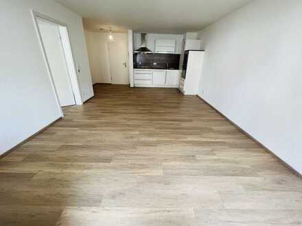 2-Zimmer Erdgeschosswohnung mit Terrasse / Garten, EBK, und TG-Stellplatz unweit der Lidl- Zentrale