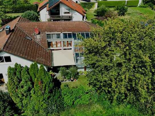 Einzigartiges Einfamilienhaus mit großem Schwimmbad und vielen Möglichkeiten in Schopflenberg