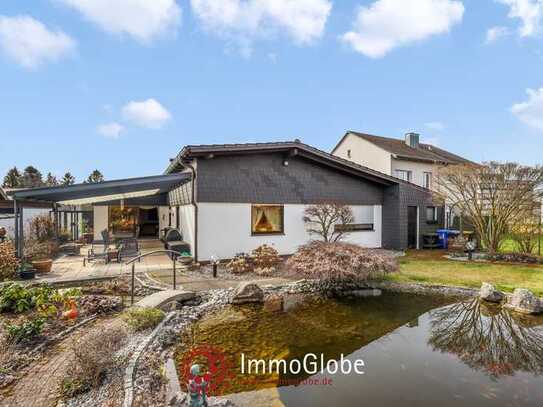 Zeitlos wohnen am Sommerwald – Großzügiger Bungalow mit Gartenparadies
