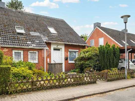 Schöne DHH mit Terrasse, Garten, Garage sowie weiteren Stellplätzen in Henstedt-Ulzburg zu verkaufen