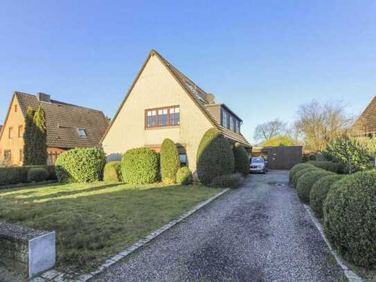 Charmante Erdgeschosswohnung im Zweifamilienhaus mit Terrasse, Garten und Garage – in ruhiger Lage