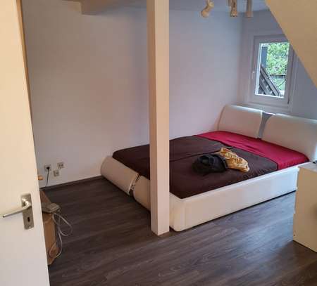 Stilvolle 1-Zimmer-Dachgeschosswohnung mit Balkon und Einbauküche in Bad Herrenalb