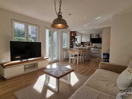 Exklusive Terrassenwohnung mit Garten und Garage