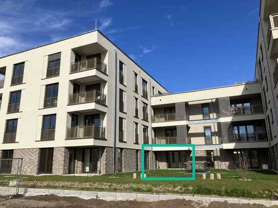 Neubau-Erstbezug: Drei-Zimmer-Wohnung mit Terrasse und eigenem Gartenanteil