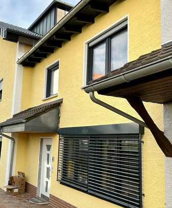 Schicke Maisonette-Wohnung mit Garten in zentraler Lage