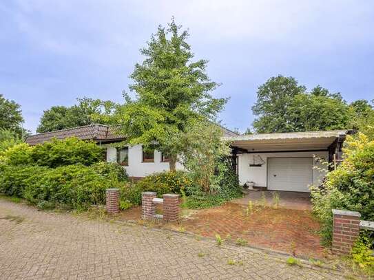 Traumhafte Lage! Gepflegter Bungalow auf großem Wassergrundstück