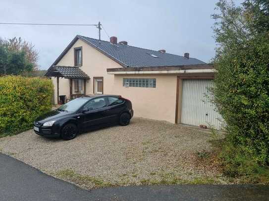 Einfamilienhaus mit großem Grundstück in Dickesbach