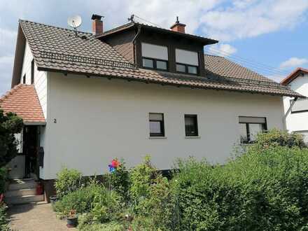 Gepflegtes Zweifamilienhaus mit Garten am Katzenbuckel -
Einziehen und los leben in Oberdielbach