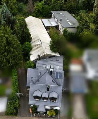 Exklusives Anwesen für Unternehmer: Wohn-/Bürohaus und Lagerhalle mit Bauland in Top-Lage Mülheims