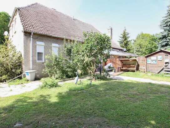 Familienparadies in Bredow: Einfamilienhaus mit Einliegerwohnung und großem Garten