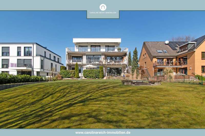 Energieeffiziente EG-Wohnung mit großer Südterrasse, Garten und TG-Stellplatz