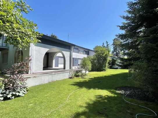 Exklusives Wohnen in einer Haus-in-Haus Einheit mit Südterrasse und Garten