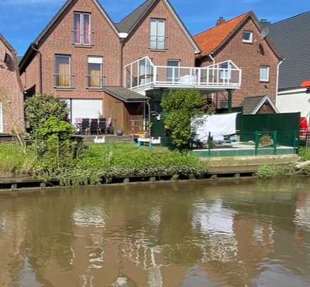 Geschmackvolle 5-Raum-Doppelhaushälfte mit gehobener Innenausstattung und EBK in Jork. Flussblick.