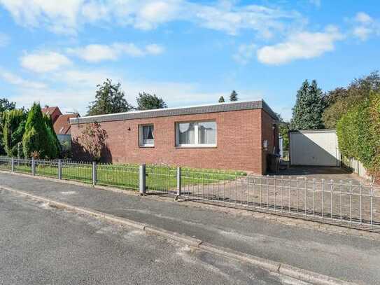 Bremen-Burgdamm: Gemütlicher Flachdachbungalow mit Terrasse und Garage !!!Achtung Bieterverfahren!!!