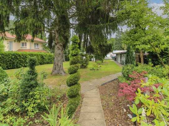 Wohnparadies auf Erbbaugrund mit modernisiertem Bungalow, Wellness-Oase und zauberhaftem Garten