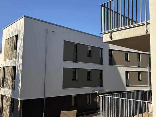 Erstbezug – moderne 3-Zimmer-Wohnung mit EBK & Balkon inkl. zwei Tiefgaragenparkplätze und Wallbox