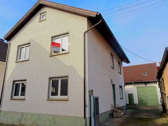 Einfamilienhaus mit Terrasse, zweistöckiger Scheune und großem Garten in ruhiger Lage in Sandhausen