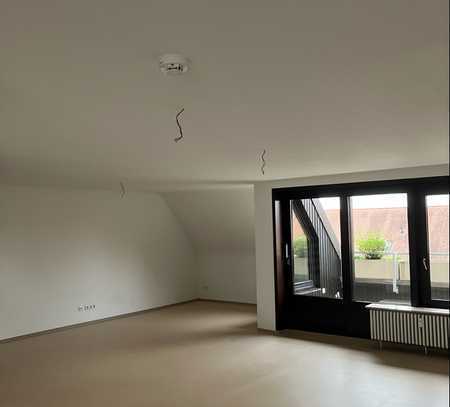 3 Zimmer-Maisonette mit Dachloggia und Blick über den Dächern