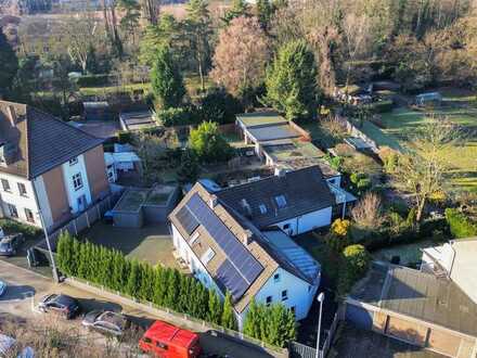 Perfekte Harmonie: Modernes Mehrfamilienhaus mit 3 Wohneinheiten in Top-Lage