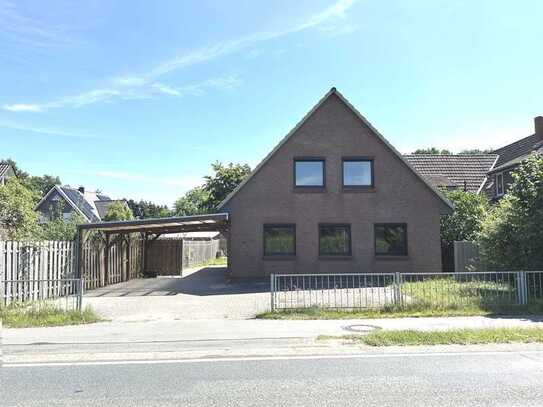 PURNHAGEN-IMMOBILIEN - Schwanewede-Metjensande - geräumiges 1-Fam.-Haus mit großem Grundstücksantei