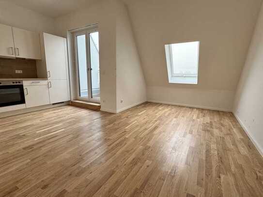 Lichtdurchfluteter Erstbezug mit Loggia, Einbauküche und 2 Bädern