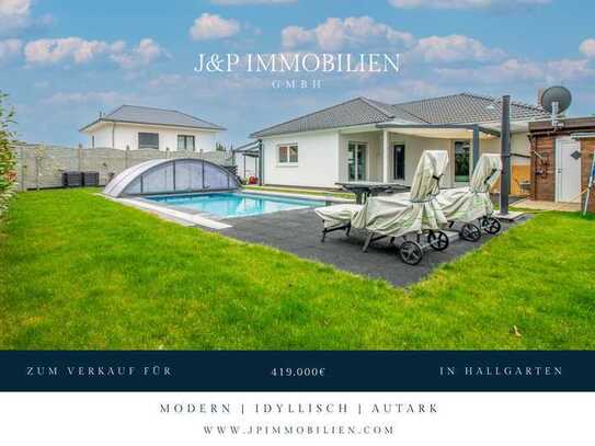 Modernes und autarkes Einfamilienhaus in idyllischer Lage mit gehobener Außenanlage und Pool