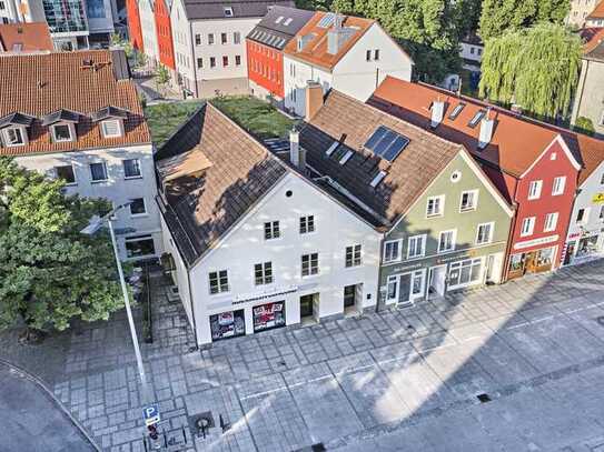 Hochwertiges Wohn- & Geschäftshaus mit genehmigter Baureserve!