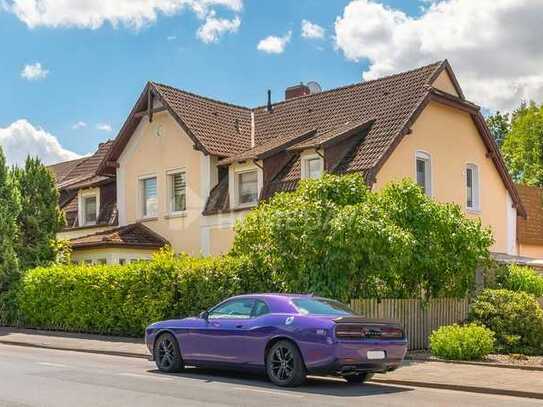 Moderne Erdgeschosswohnung mit Wintergarten, Terrasse und Garten