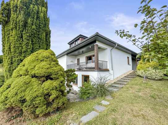 Geräumiges Einfamilienhaus mit großem Garten und unverbautem Blick in Gießen-Lützelinden