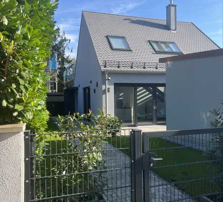 Charmantes Einfamilienhaus mit Garten in München-Daglfing