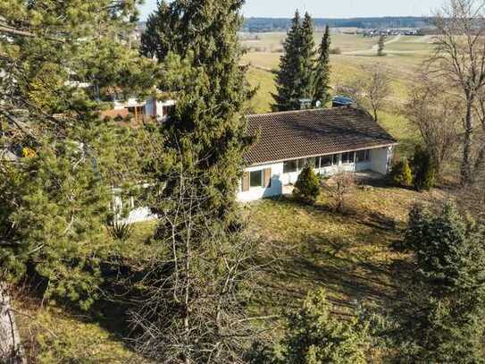 ENGEL & VÖLKERS: Bungalow mit großzügigem Baurecht in Aufkirchen