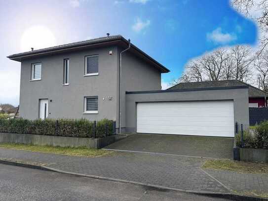 Willkommen Daheim. Moderne Niedrigenergie Stadtvilla mit Doppelgarage in zentraler Lage von Elstal.