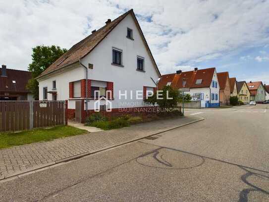 Sanierungsbedürftiges Zweifamilienhaus in sehr guter Wohnlage