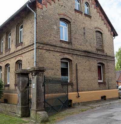 Attraktive Wohnung mit Gartenanteil