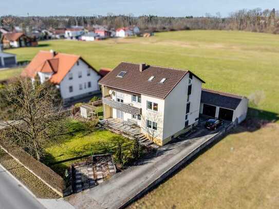 Wohnen im Grünen: Zweifamilienhaus mit großem Garten und viel Potenzial!