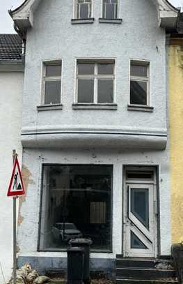 Einfamilienhaus mit Gewerbefläche in Bettingen!